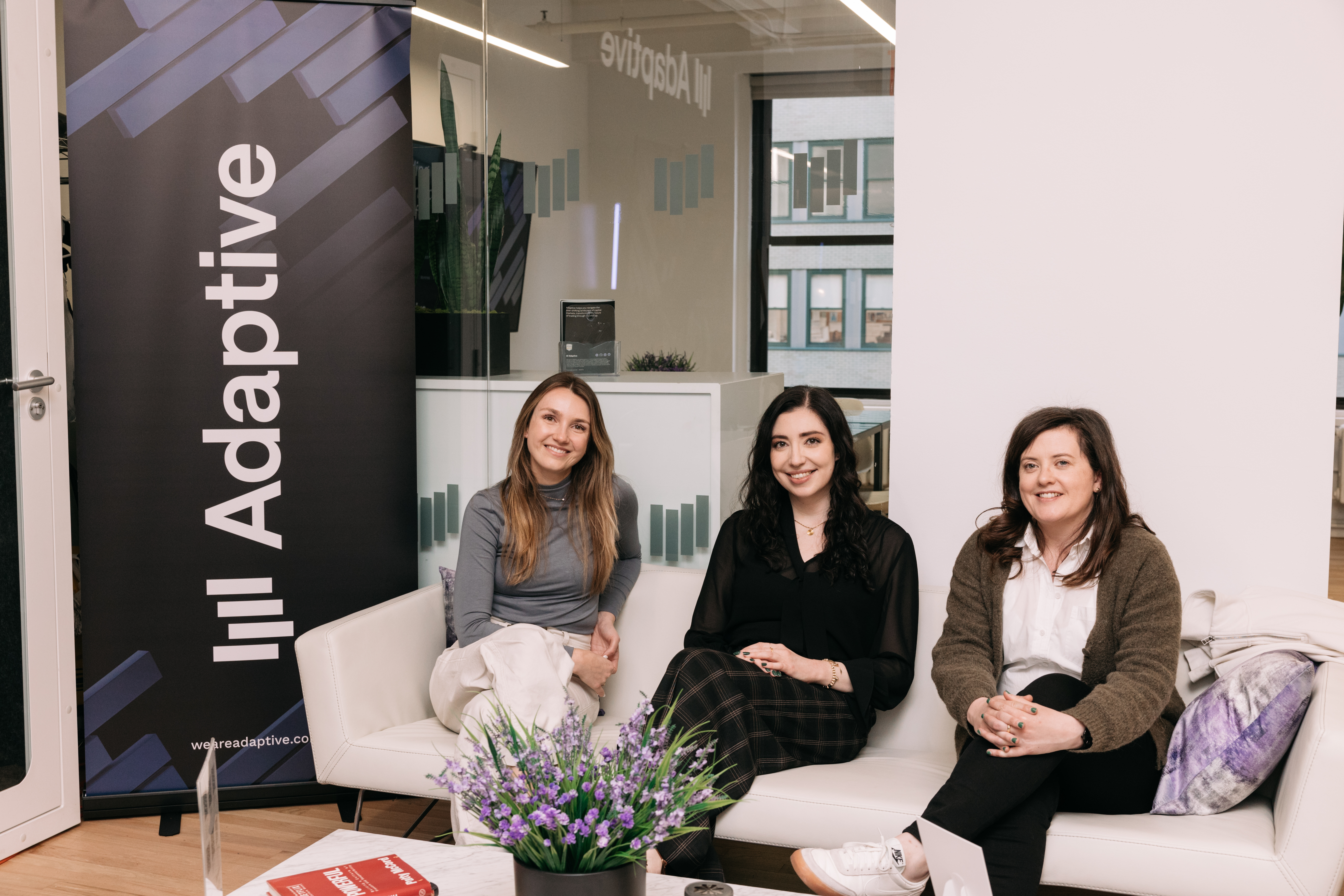 Group photo of three women in New York office