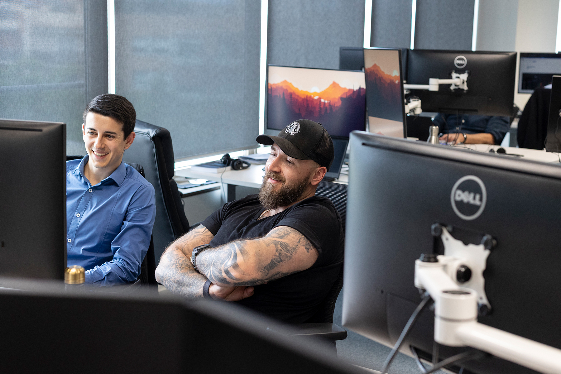 Two men working at Barcelona office